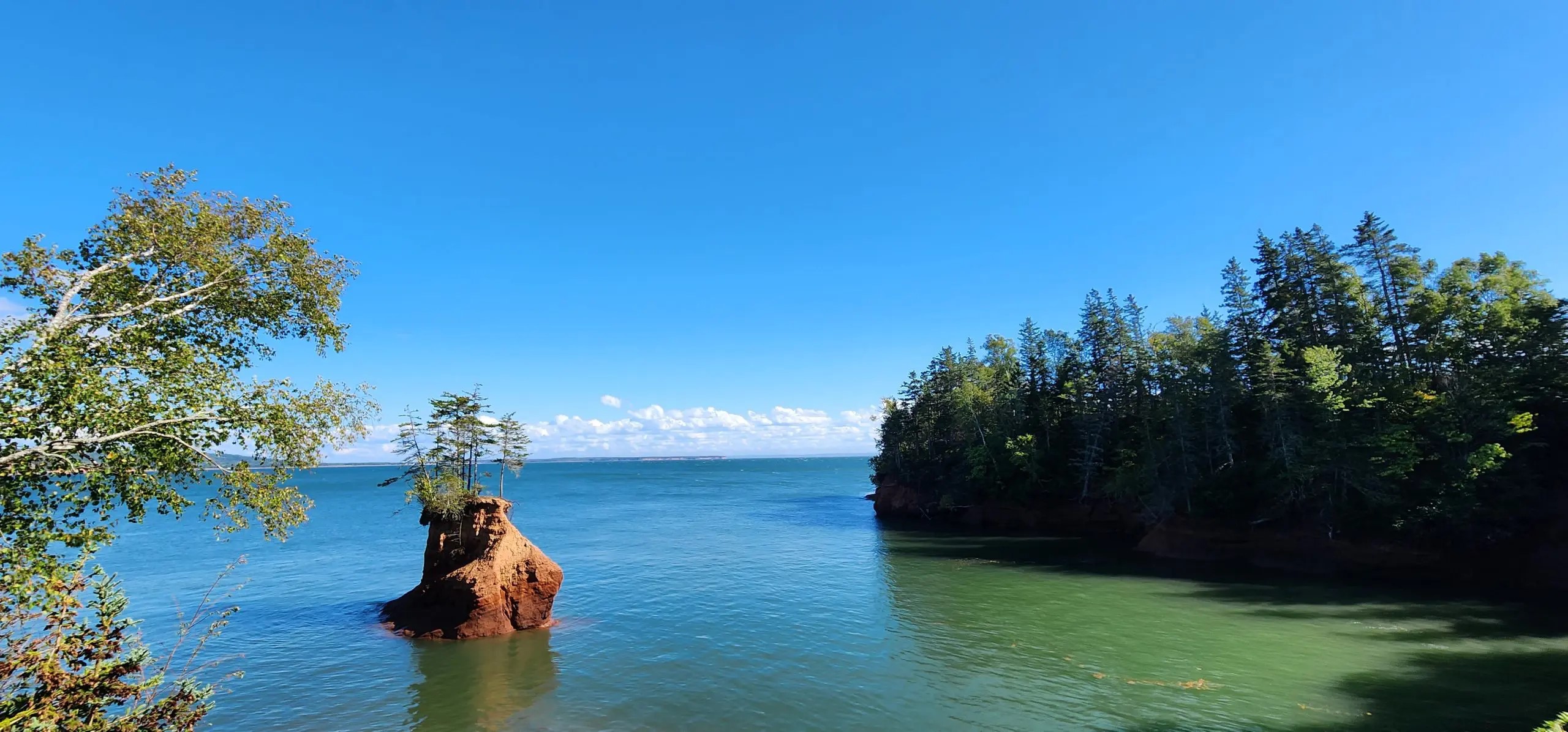 Dramatic tidal flats of the Bay of Fundy at low tide, with exposed ocean floor