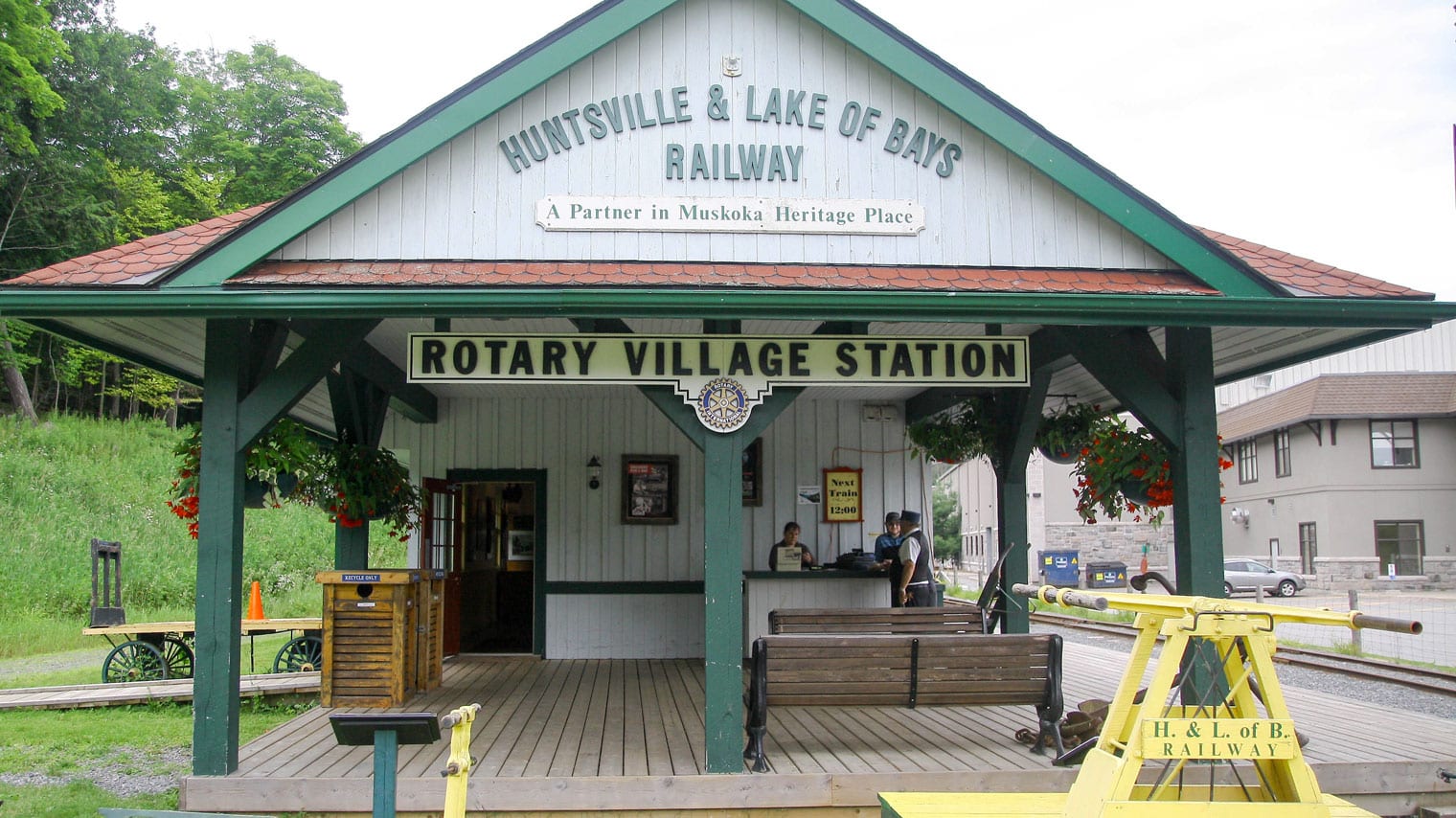 Muskoka Heritage Place, Huntsville, Ontario: Historic pioneer village buildings and train.