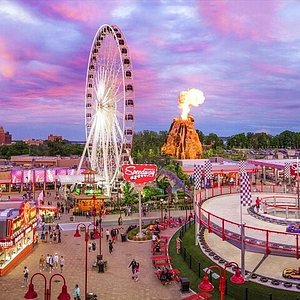 Clifton Hill in Niagara Falls, Ontario: View of the street with attractions lit up at night.