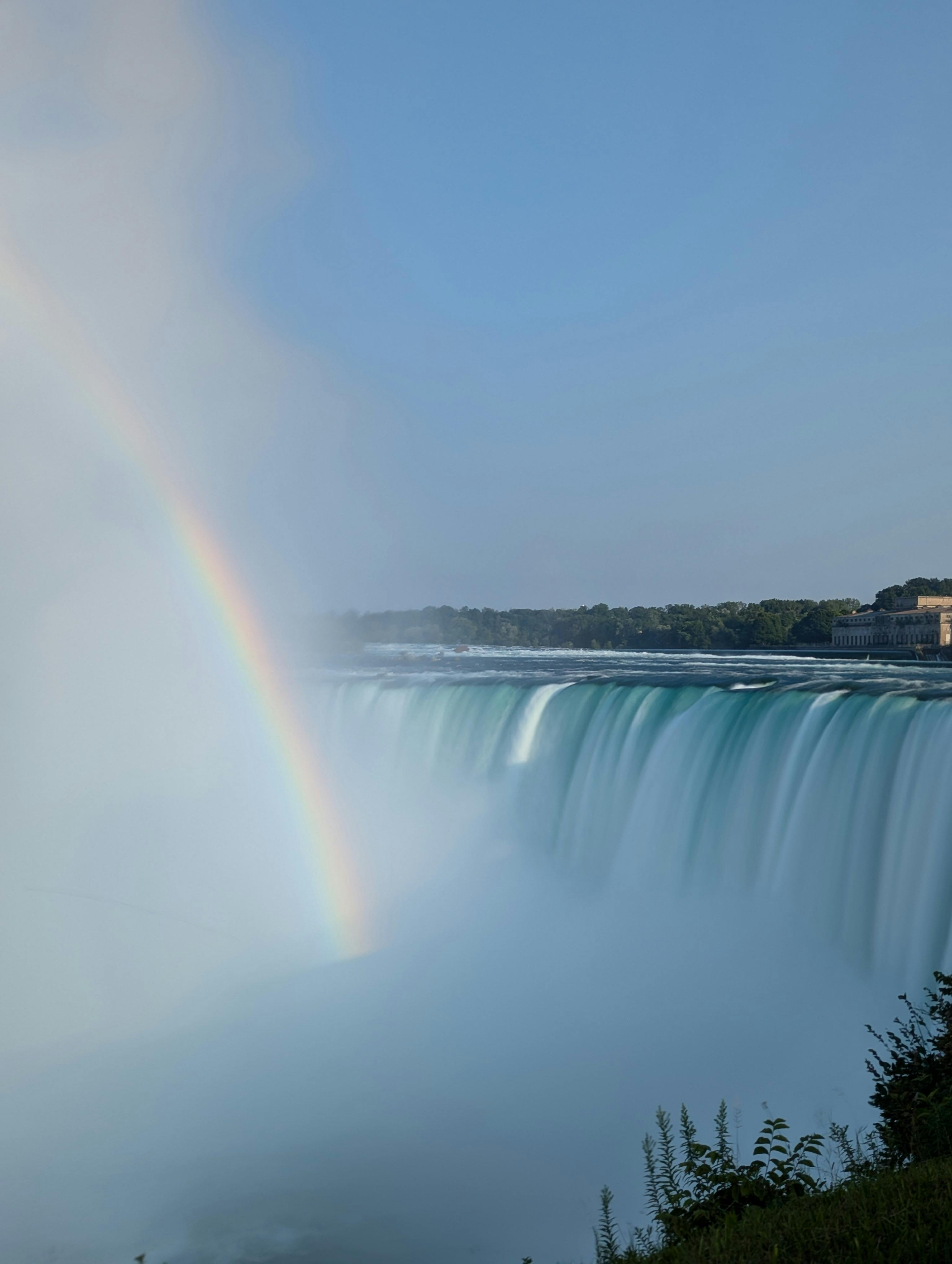 Journey Behind the Falls in Niagara Falls, Ontario: People on an observation deck next to the roaring Horseshoe Falls.