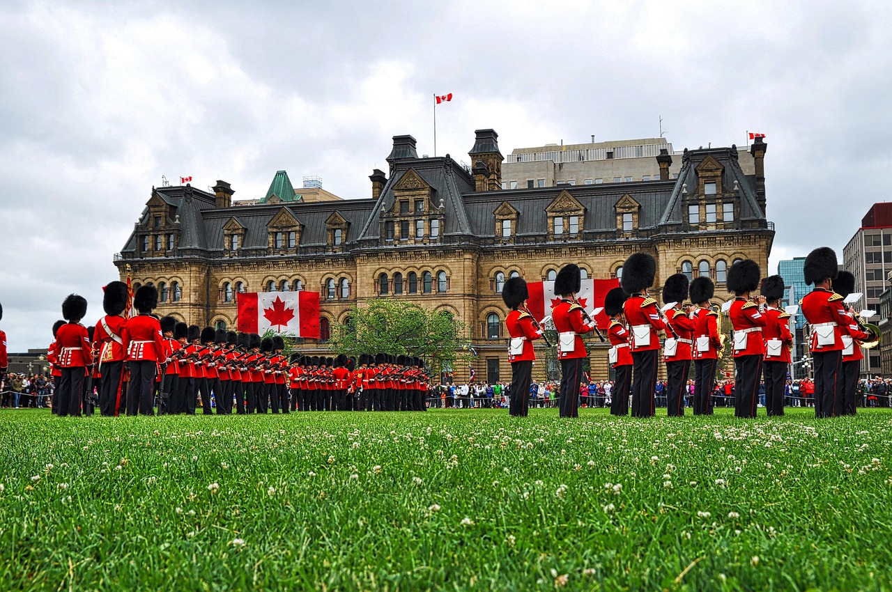 Parliament Hill in Ottawa with Canadian flag